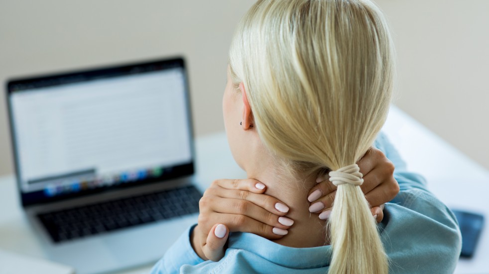 Woman with sore neck